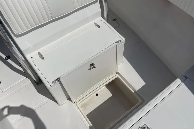 Slide: The Image of White seating area on a 2003 Jupiter 27 boat with dual engines. - 40