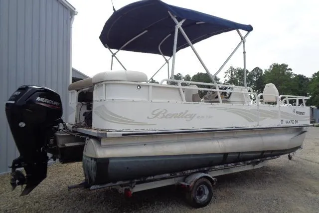 Slide: The Image of 2008 Bentley Pontoons 200 CRUISE boat with canopy and Mercury outboard motor on trailer. - 8