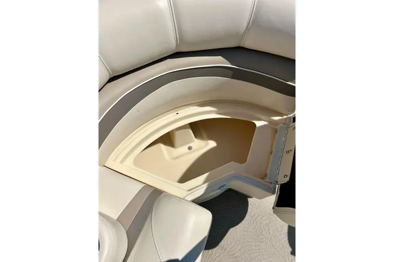 Slide: The Image of 2006 Bennington 2250 RL boat seat storage compartment, open and empty. - 12