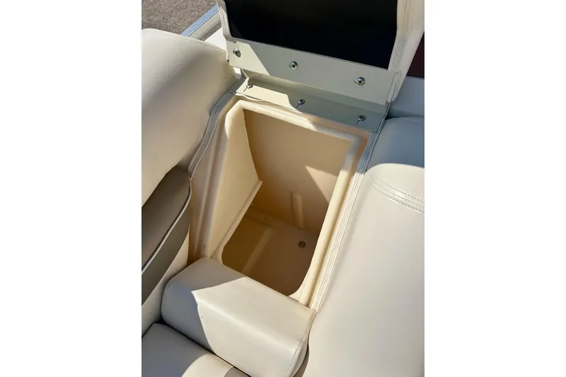 Slide: The Image of Open storage compartment in 2006 Bennington 2250 RL boat seat. - 17