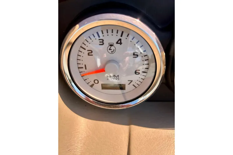 Slide: The Image of Close-up of a tachometer in a 2006 Bennington 2250 RL boat. - 36
