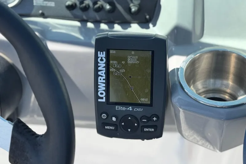 Slide: The Image of Lowrance Elite-4 DSI fishfinder on 2014 Chaparral 21 H2O Sport dashboard. - 26