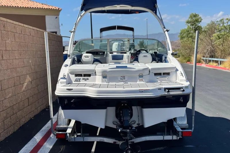 Slide: The Image of 2014 Chaparral 21 H2O Sport boat on trailer, rear view, sunny day. - 4