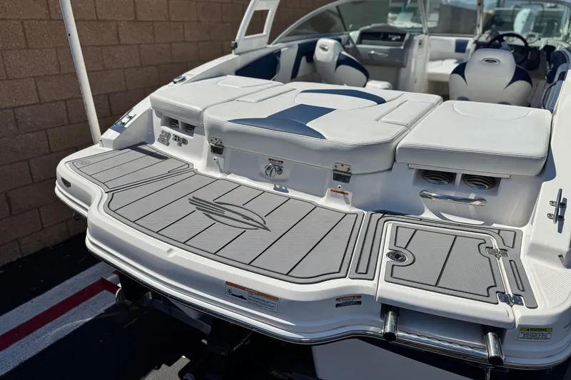 Slide: The Image of 2014 Chaparral 21 H2O Sport boat with spacious rear deck and seating. - 6