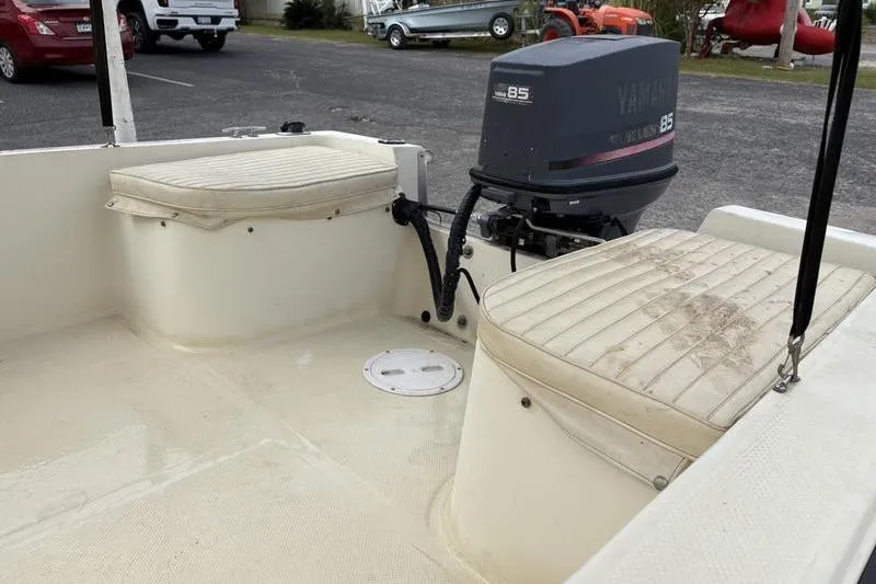 Slide: The Image of 1996 Key West 1720 Dual Console boat interior with Yamaha 85 outboard motor. - 8