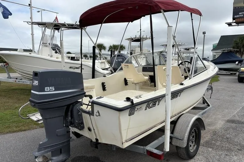 Slide: The Image of 1996 Key West 1720 Dual Console boat with Yamaha 85 outboard motor on trailer. - 9
