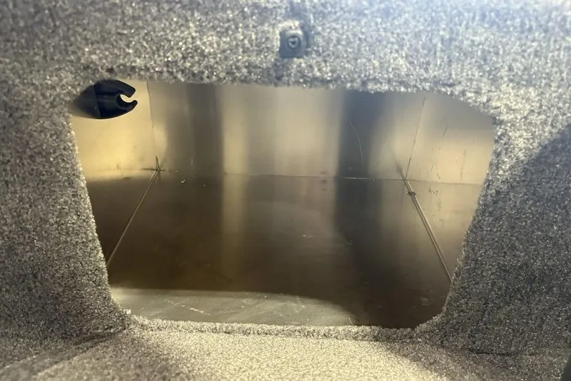 Slide: The Image of Interior storage compartment of 2026 Tracker Bass Tracker Classic XL boat. - 12