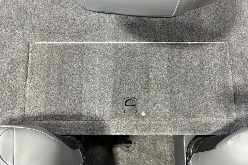 Slide: The Image of 2026 Tracker Bass Tracker Classic XL interior carpeted floor detail. - 18