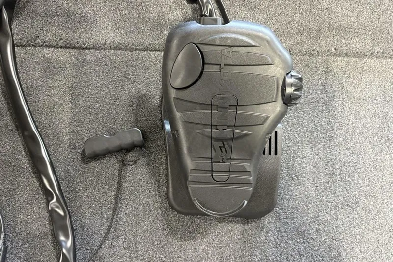 Slide: The Image of 2026 Tracker Bass Tracker Classic XL boat foot pedal on gray carpet. - 3