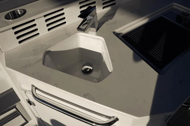 Slide: The Image of Luxury sink and countertop on 2022 Cruisers 42 GLS yacht. - 18