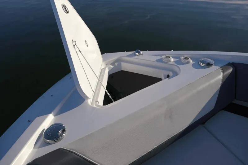 Slide: The Image of 2022 Cruisers 42 GLS boat with open storage compartment on deck. - 27