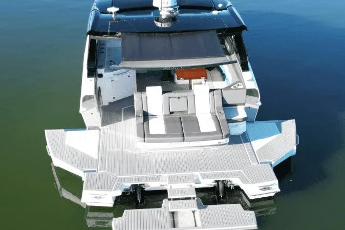 Slide: The Image of 2022 Cruisers 42 GLS luxury yacht with spacious deck and modern design. - 7