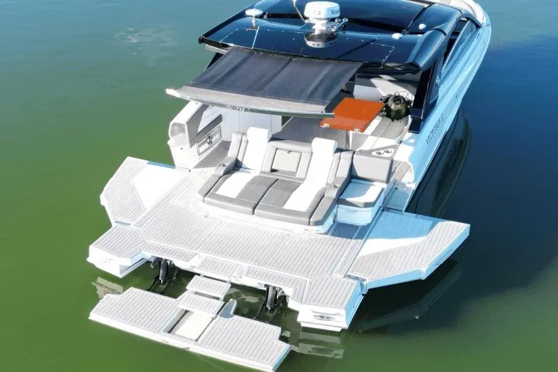 Slide: The Image of 2022 Cruisers 42 GLS luxury yacht with spacious deck and modern design. - 9