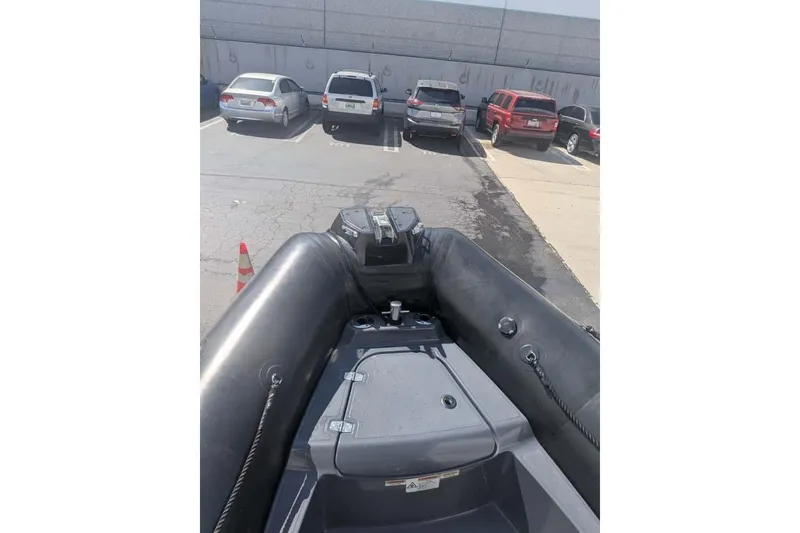 Slide: The Image of Zodiac 20 inflatable boat parked in a lot, 2022 model. - 14