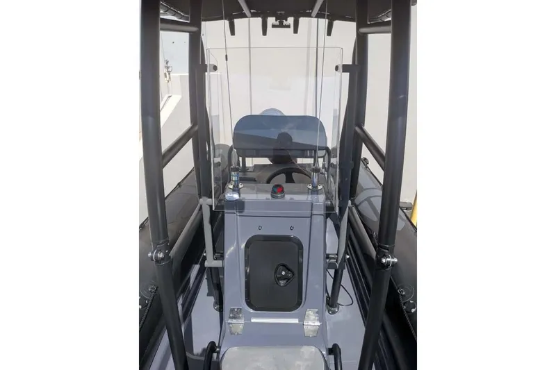 Slide: The Image of 2022 Zodiac 20 boat interior with steering wheel and control panel. - 17