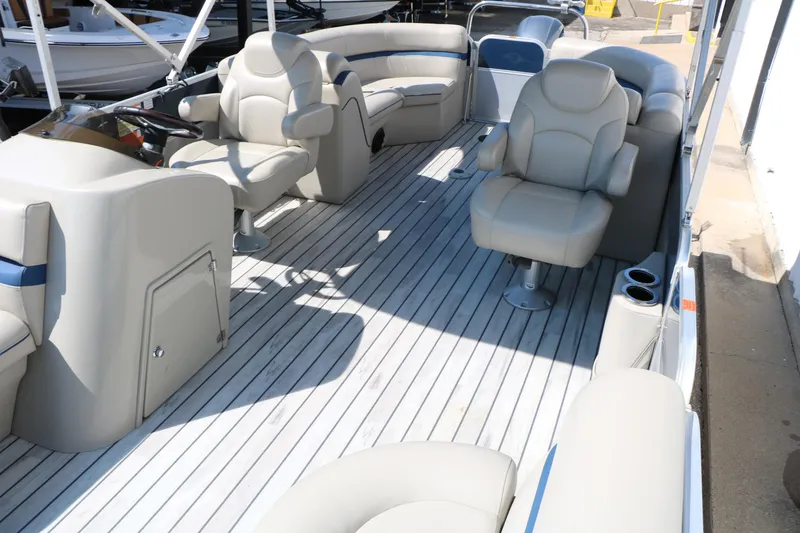 Slide: The Image of 2017 Berkshire 22 RFX Cts Tri-toon boat interior with plush seating and modern design. - 20