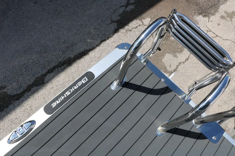 Slide: The Image of 2017 Berkshire 22 RFX Cts Tri-toon boat ladder and deck detail. - 43