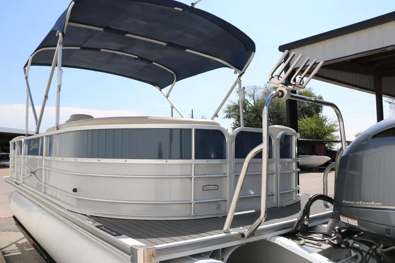 Slide: The Image of 2017 Berkshire 22 RFX Cts Tri-toon pontoon boat with canopy and outboard motor. - 8