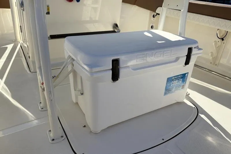 Slide: The Image of Engel cooler on 2025 Pioneer 202 Islander boat deck, sunlight casting shadows. - 9