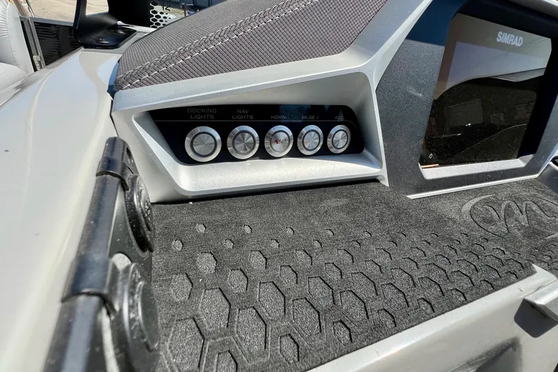 Slide: The Image of Control panel of 2018 Manitou MD 25 TriToon boat with navigation and docking lights. - 12