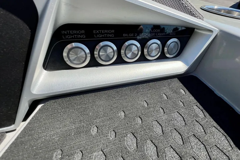 Slide: The Image of Control panel of 2018 Manitou MD 25 TriToon with lighting and accessory buttons. - 14