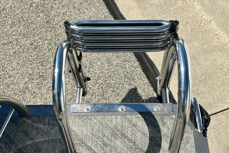 Slide: The Image of Stainless steel ladder on 2018 Manitou MD 25 TriToon boat deck. - 6