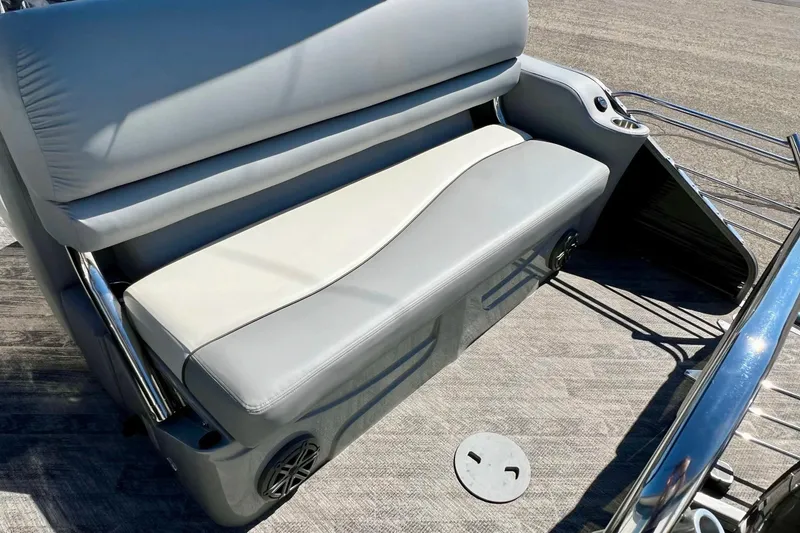 Slide: The Image of 2018 Manitou MD 25 TriToon boat seat with gray upholstery and cup holder. - 8