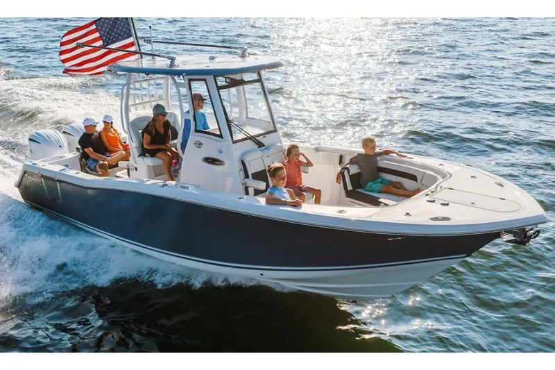 Slide: The Image of 2026 Tidewater 282 CC Adventure boat console with steering wheel and control panel. - 10