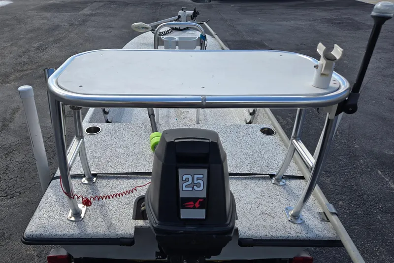 Slide: The Image of 2014 IBP 14 Skiff boat with 25 HP motor and fishing platform. - 13