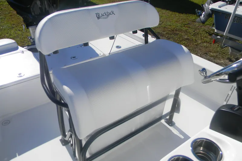 Slide: The Image of BlackJack 224 boat seat, 2026 model, featuring white upholstery and sturdy metal frame. - 14