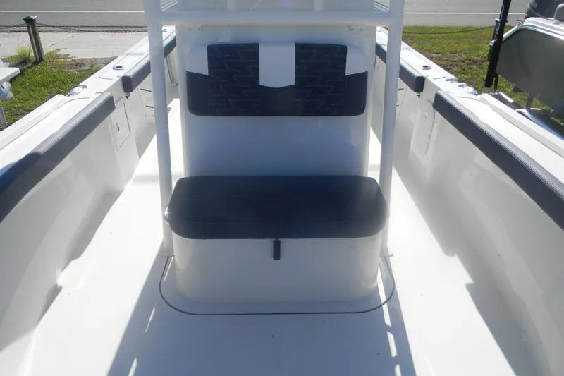 Slide: The Image of 2026 Parker 230 Coastal Elite boat interior with cushioned seating and sleek design. - 15