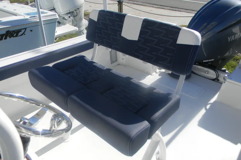 Slide: The Image of 2026 Parker 230 Coastal Elite boat seat with blue and white upholstery. - 16