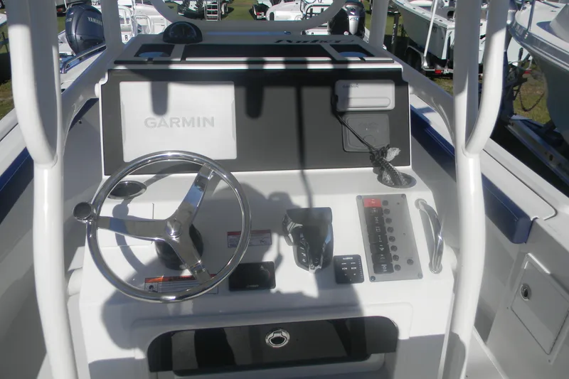 Slide: The Image of 2026 Parker 230 Coastal Elite boat dashboard with Garmin navigation system. - 18