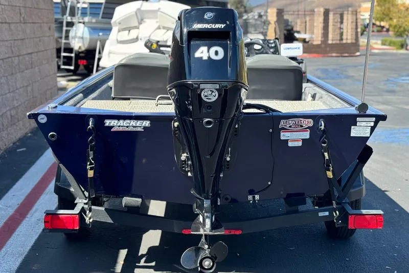 Slide: The Image of 2022 Tracker Pro 170 boat with Mercury 40 engine, parked on a trailer. - 4