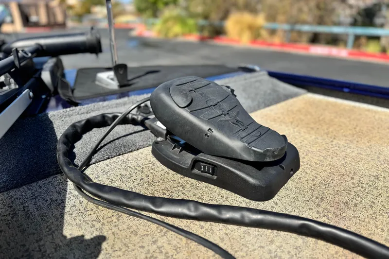 Slide: The Image of Foot pedal control on 2022 Tracker Pro 170 boat deck, close-up view. - 9