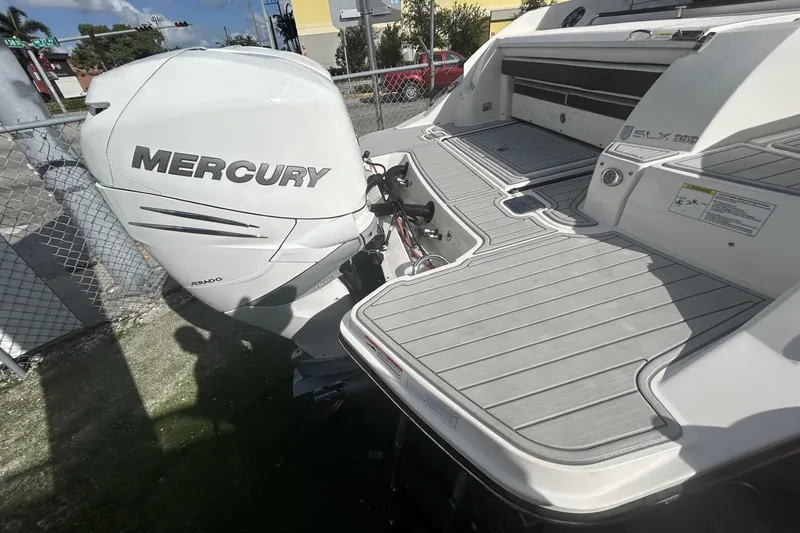 Slide: The Image of 2019 Sea Ray SLX 350 Outboard with Mercury engine, docked and ready for adventure. - 12