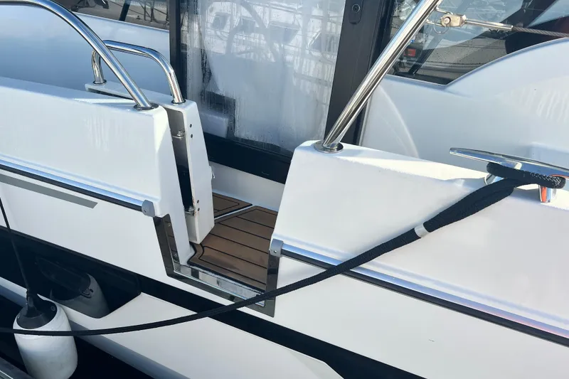Slide: The Image of 2024 Beneteau Antares 11 interior kitchen with sink and stove. - 22