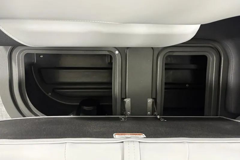 Slide: The Image of 2026 Sun Tracker SportFish 20 DLX storage compartments, featuring durable and spacious design. - 22