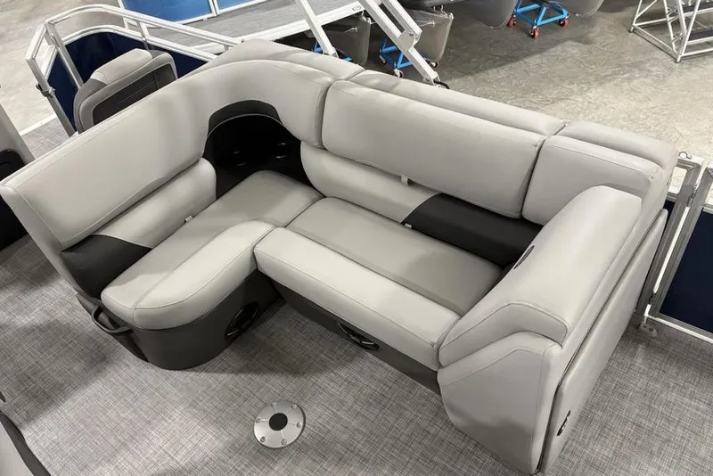 Slide: The Image of 2026 Sun Tracker SportFish 20 DLX boat interior with gray cushioned seating. - 25