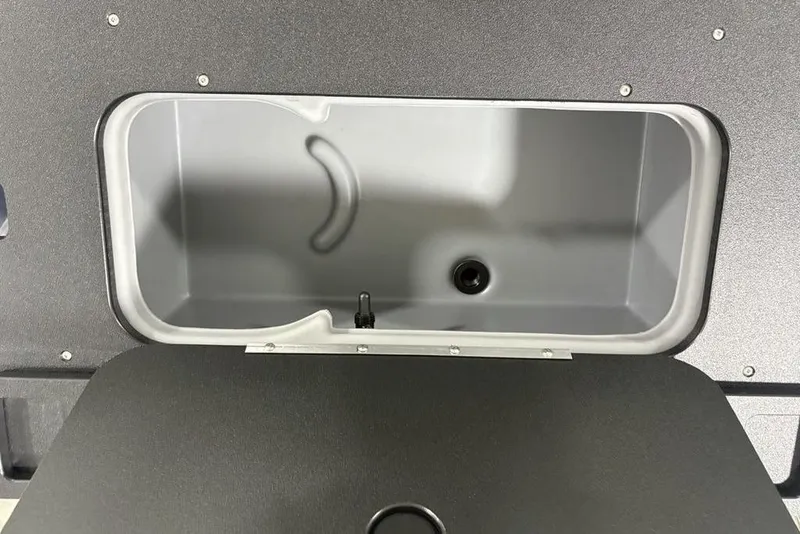 Slide: The Image of Livewell compartment in 2026 Sun Tracker SportFish 20 DLX boat. - 32