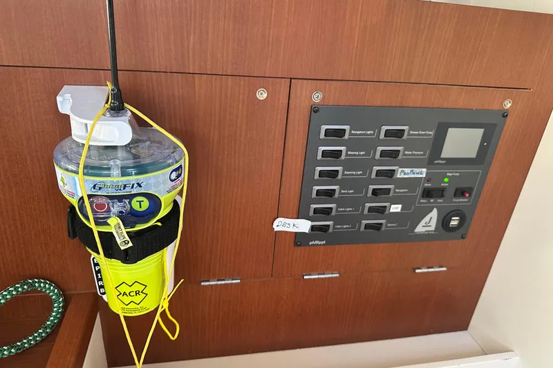 Slide: The Image of Control panel and emergency beacon on a 2021 J Boats J/99 yacht. - 27