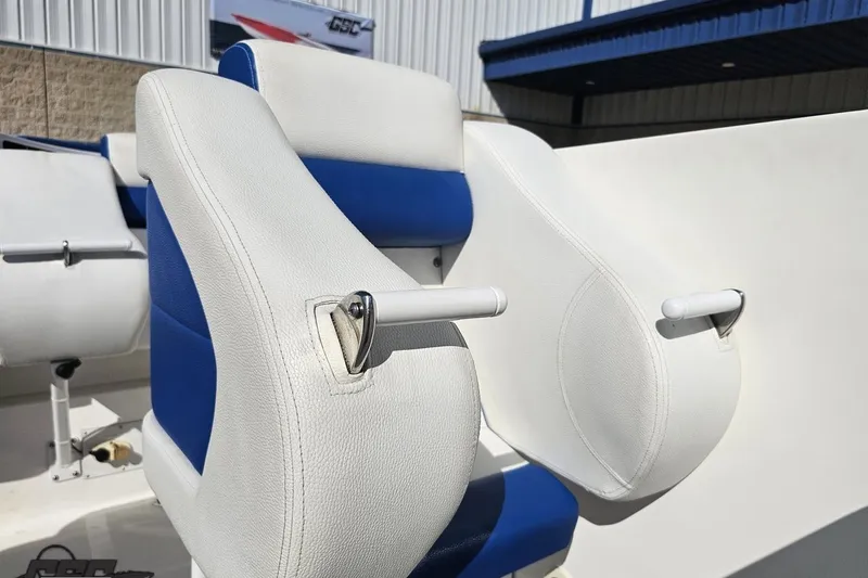 Slide: The Image of White and blue seats on a 2002 Hustler 388 SLINGSHOT boat. - 83
