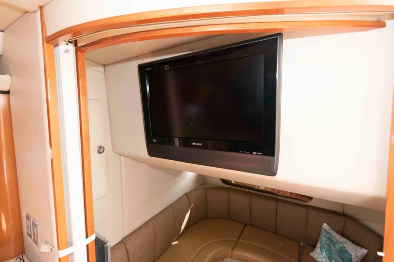 Slide: The Image of 2007 Chaparral Signature 350 interior with TV and cozy seating area. - 16
