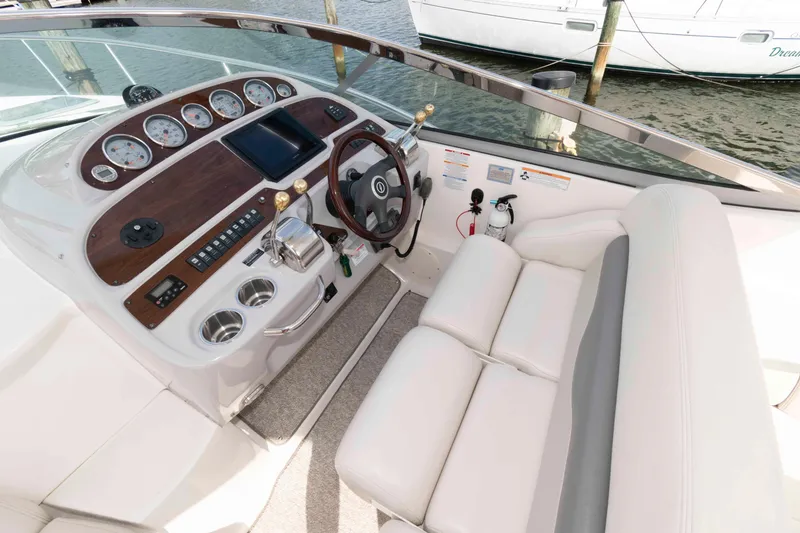 Slide: The Image of 2007 Chaparral Signature 350 helm with wood accents and modern controls. - 4