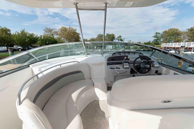 Slide: The Image of 2007 Chaparral Signature 350 boat interior with helm, steering wheel, and seating area. - 8