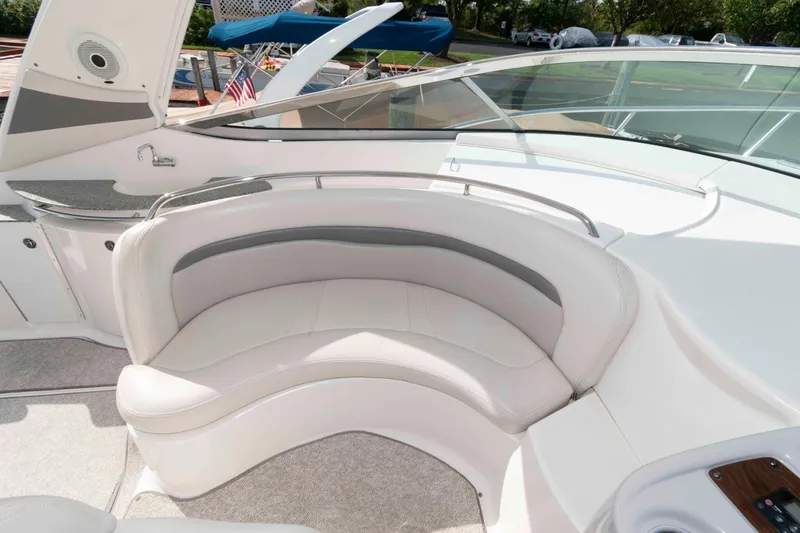 Slide: The Image of 2007 Chaparral Signature 350 boat interior with curved seating and sleek design. - 9