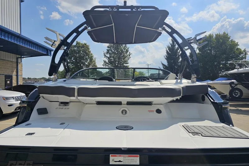 Slide: The Image of 2018 Monterey 238SS Super Sport boat, rear view, with wakeboard tower and seating. - 15