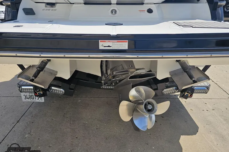 Slide: The Image of Rear view of a 2018 Monterey 238SS Super Sport boat with propeller and trim tabs. - 16