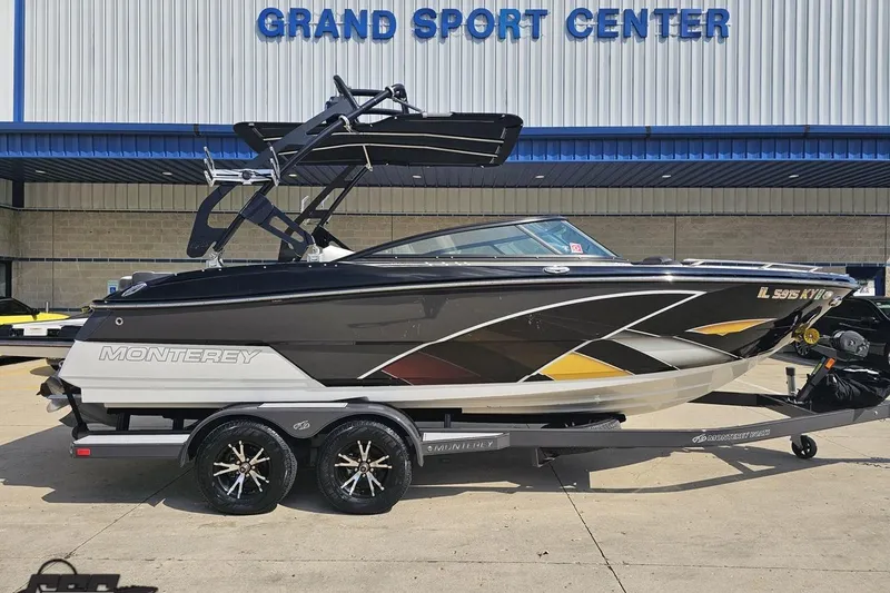 Slide: The Image of 2018 Monterey 238SS Super Sport boat on trailer at Grand Sport Center. - 2
