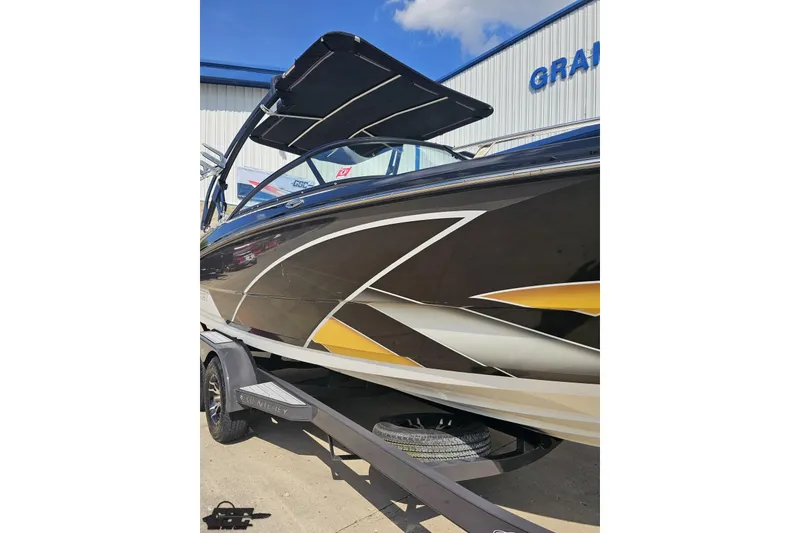 Slide: The Image of 2018 Monterey 238SS Super Sport boat with sleek design and vibrant graphics. - 22